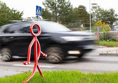 Röd reflexis, svart bil